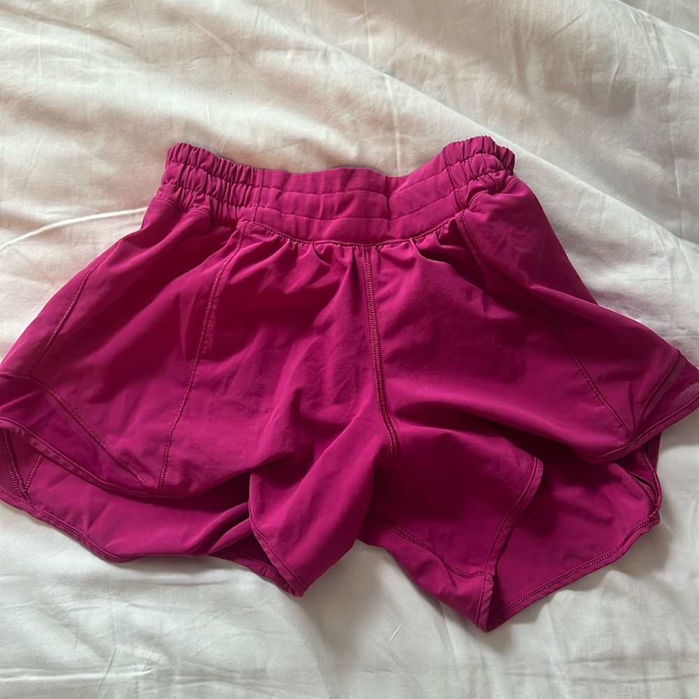Hot pink lululemon four inch shorts. Size 4